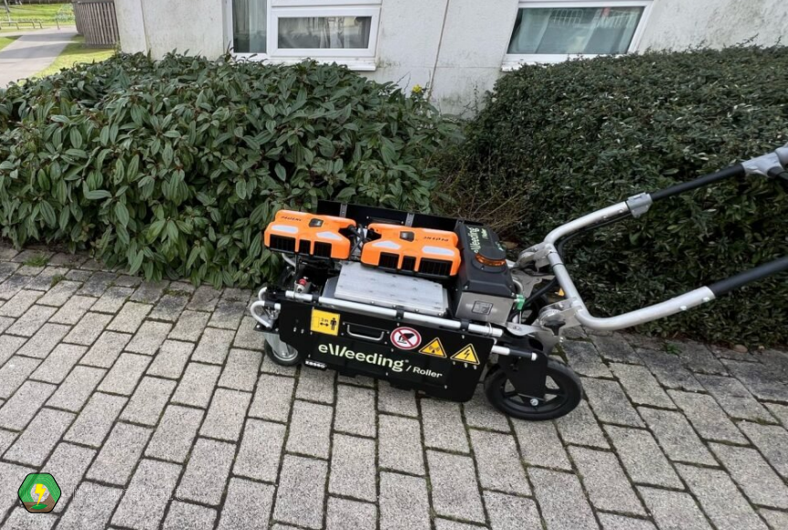 The eWeeding roller treating a section of block paving, removing weeds without herbicides
