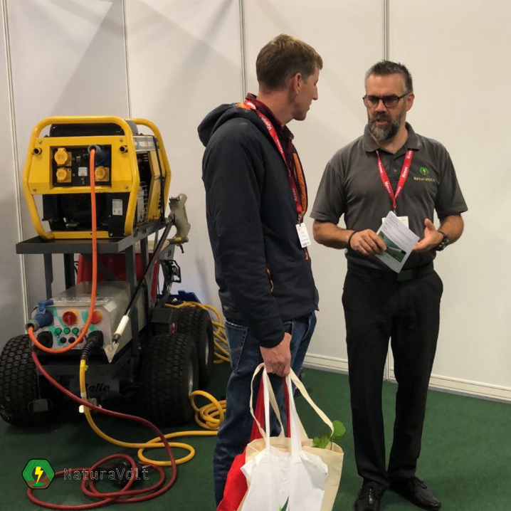 Weed management advisor explaining the spot electric weeder